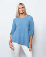 Snoskins Seersucker Knit V-Neck Body skimming with button detail at hip Matching thread Style 77585-24S