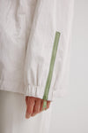 Nikki Jones Adjustable hooded blouson in soft luster sheen w/contrast trims and zipper detail on sleeves K5452RN-335 Spring 2023